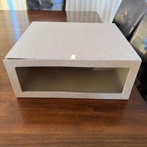 Drop front magnetic closure storage bin